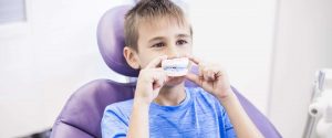 Child-visiting-the-dentist